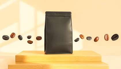 Black coffee pouch bag mockup with copy space standing on wooden pedestal with flying roasted coffee beans minimalist product packaging banner design illustration © Andrii
