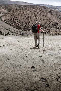 Scene featuring single mountaineer trekker walking in Himalayas mountains ecotourism concept in India