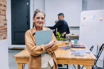 Fototapeta premium hispanic business mature woman at office or workplace