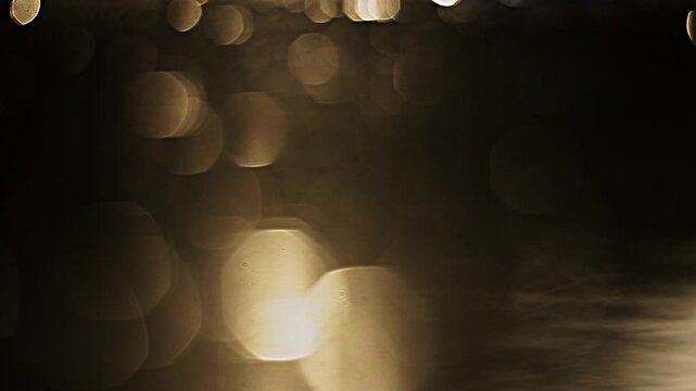 Reflection of sunset in water for natural background with glow and glitter