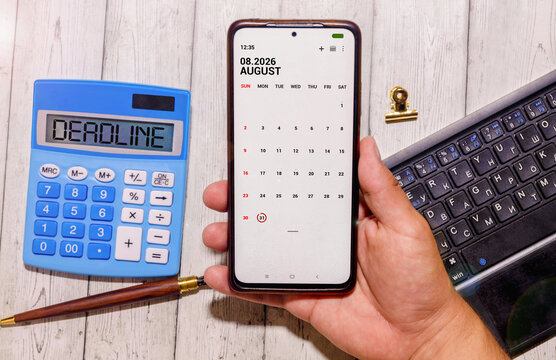 August 31, Deadline Planning Concept with Calendar App, Calculator and Business Workspace
