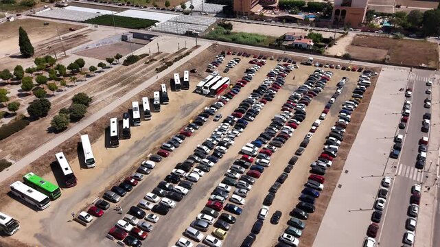 Aerial View of Large Outdoor Parking Lot Full of Cars in Spain