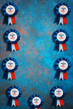 Made in usa blue ribbons with red and white tails arranged on a blue background