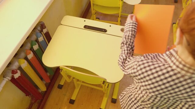 Contemporary classroom furniture with a clean, minimalist design is highlighted in this educational setting. The inviting atmosphere encourages learning and student engagement