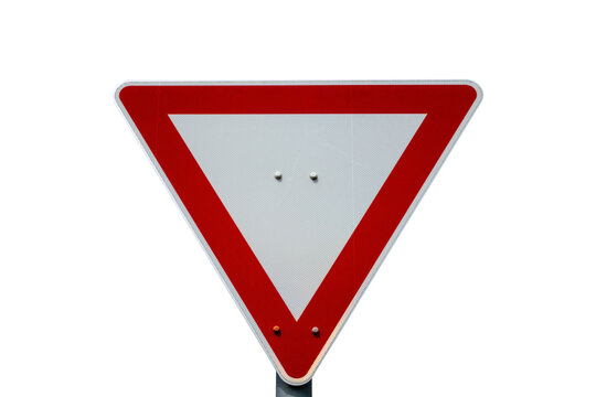 Triangular yield road sign featuring a bold red border isolated on a pure white background