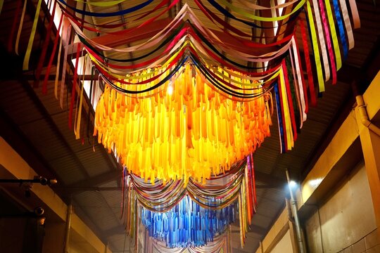 Glowing Yellow and Blue Ribbon Chandeliers Hanging Overhead in Mercado 20 de Noviembre (Oaxaca de Juarez, Oaxaca, Mexico)