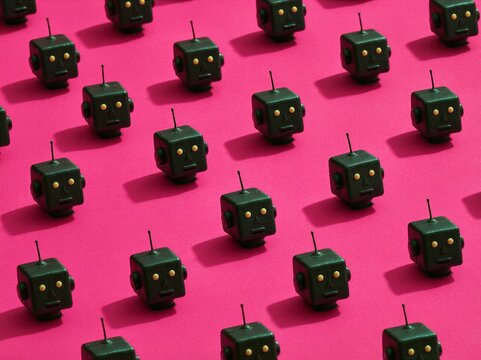 Minimalist Black Robot Head Pattern on Hot Pink Background