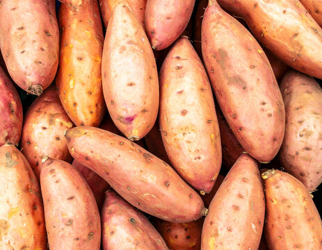 Sweet potatoes, or yams, macro shot, full frame. AI