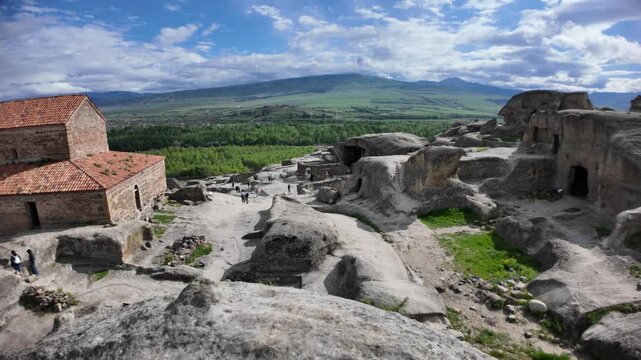 church of Uplistsikhe rock-hewn town presenting its distinctive cave architecture carved into sandstone in Georgia near Gori city