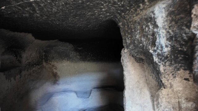 wine cellar of Vardzia cave monastery interior showing excavated storage facilities or qvevri, part of the extensive medieval rock-cut settlement carved into Erusheti Mountain in Georgia