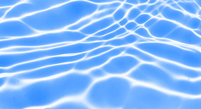 Abstract blue water surface with light reflections isolated on transparent background