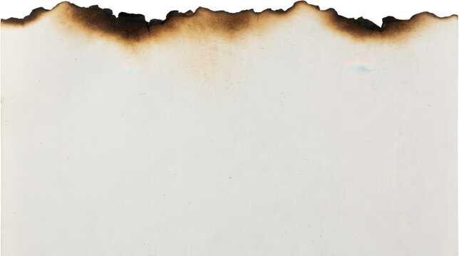 Detailed close up view of an aged vintage paper sheet featuring a dark burnt edge and scorched charred border along the top side showcasing rough texture and weathered parchment style