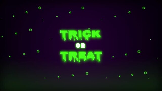Glowing green dripping trick or treat text animation on dark background
