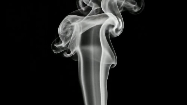 Dramatic swirling white smoke against black background