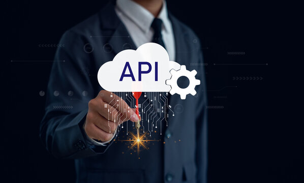 Business professional developing cloud API integration for digital transformation, software development, system connectivity, data exchange, automation, enterprise applications, scalable technology.