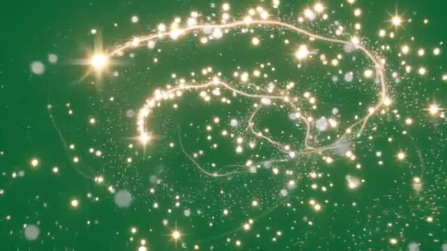 Golden sparkle particles swirling on green. Glowing light dust vortex motion background.