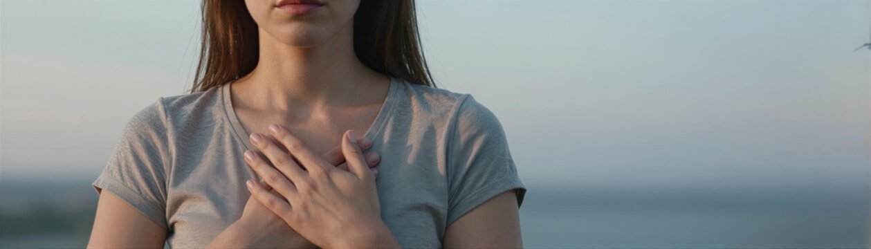 Young Woman As Main Subject Positioned In Foreground With Chest Prominently Displayed Against Of Focus Background Outdoor Setting Near