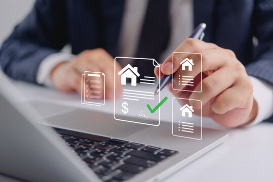 Businessman in suit signing virtual real estate contract with house icon and green checkmark representing digital mortgage approval property investment and smart agreement concepts