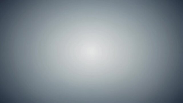 A smooth gradient of light gray fills the frame with a soft and clean texture.