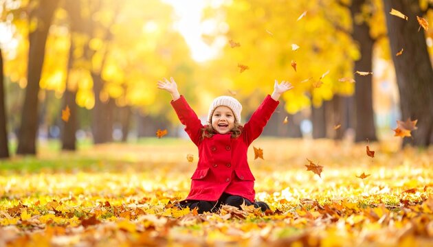 Child Playing in Autumn Leaves Outdoors
