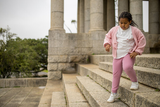 Girl exploring Cape Town Rhodes Memorial