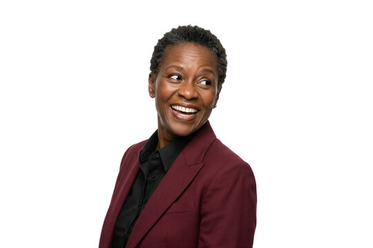 Woman smiles and looks at camera while wearing maroon suit. Indoor setting with plain white background. Concept of business, confidence, personal branding
