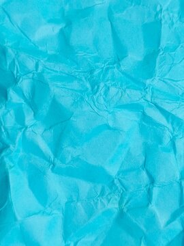 crumpled paper texture. Blue paper texture surface for background. Blank recycle blue paper crumpled texture with copy space for text