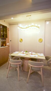 Modern dining room interior design. Luxury apartment dining area with contemporary furniture.