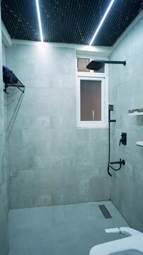 Modern bathroom interior in a luxury apartment. Contemporary washroom with minimalist design.
