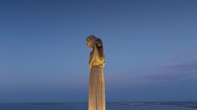 lluminated Cristo Rei Monument Against Blue Evening Sky