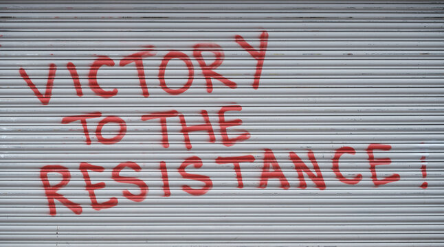 Victory To The Resistance on Closed Shutter Door