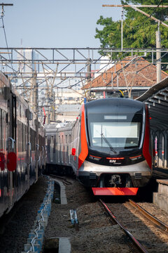 Jakarta, Indonesia - July 29, 2026: KAI Commuter CLI-125 train arrives at the platform at Jakarta Kota Station.