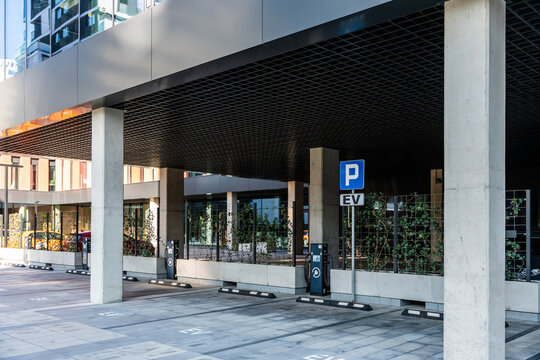Electric Vehicle Charging Station Parking Garage Modern Office Building Sustainable Mobility