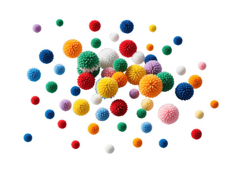 Colorful fuzzy pompoms falling, isolated on transparent background