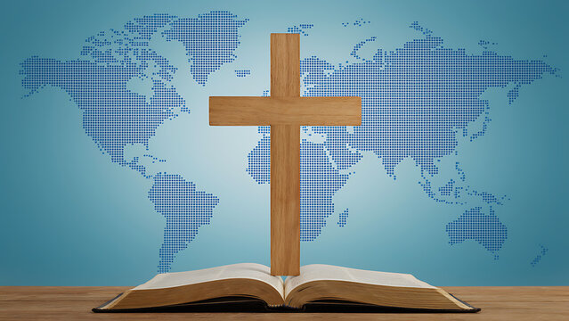 Christian cross standing on open holy bible book on wooden table
