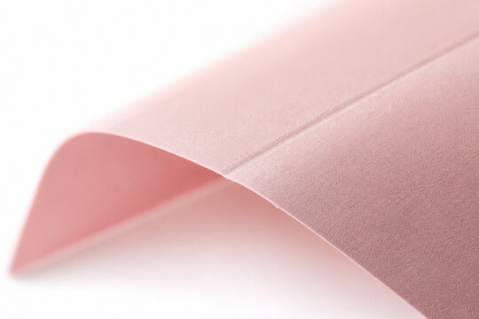 Macro folded pink paper texture on white, Generative AI