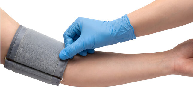Medical professional wearing blue gloves applying a grey blood pressure cuff onto a patient arm isolated on transparent background