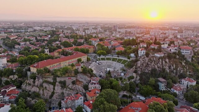 Plovdiv old town ancient roman theatre aerial view sunset golden light cityscape skyline Bulgaria travel landmark historic architecture tourism background