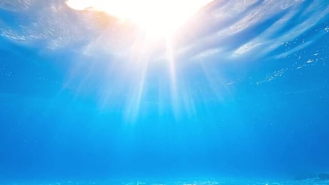 海中に差し込む太陽光の背景動画 ダイビング・マリンスポーツ向け