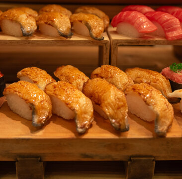 a selection of Aburi Sushi, featuring lightly torched toppings that create a caramelized texture