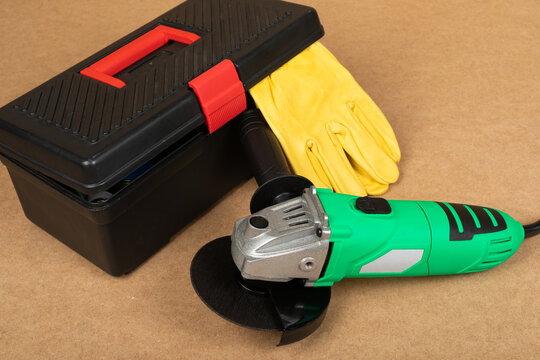 Angle Grinder with Protective Gloves and Portable Toolbox