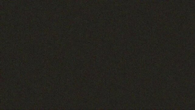 Dark textured background with subtle grain and noise for digital design and creative projects, abstract and minimalist visual element