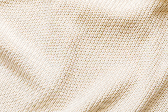 Soft Beige Knitted Cotton Fabric Macro Texture Background