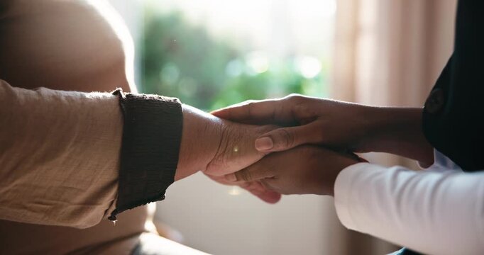 Caregiver, holding hands and senior person with support, empathy and trust in nursing home for help. Healthcare worker, old woman and elderly care with kindness, nurse and comfort with homecare