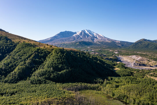 Aerial drone photo of Mount St. Helens and the recovering volcanic landscape in Washington, USA showing regenerating forests after the 1980 eruption in the Pacific Northwest