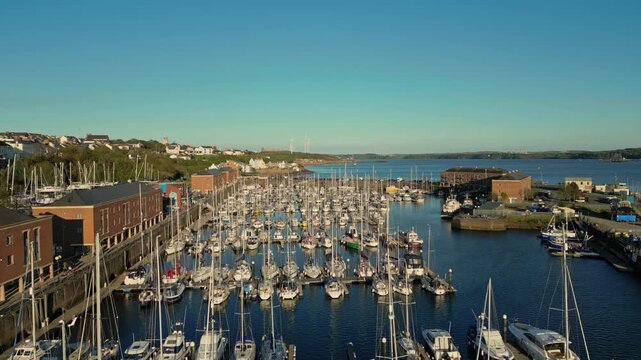 Aerial video Milford Haven Marina Wales UK. Milford Haven mouth of the two rivers Cleddau') is a town and community in Pembrokeshire.