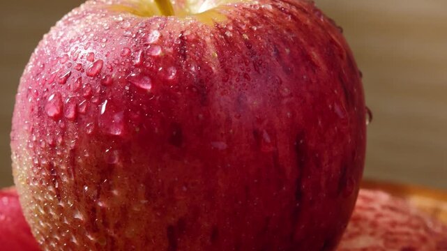 Fresh Red Apple with Water Droplets on Its Skin