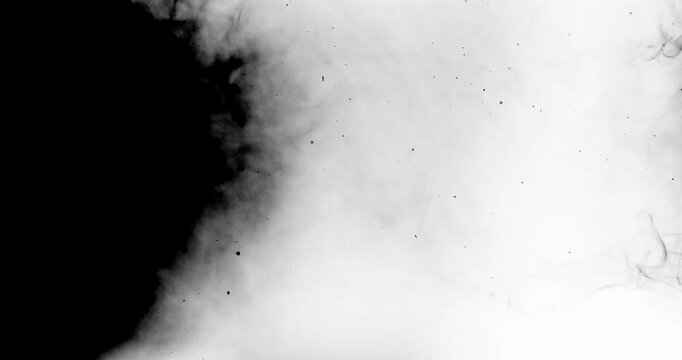 Dark smoke swirls and expands across a black background, gradually filling the frame with white light before receding back into darkness.
