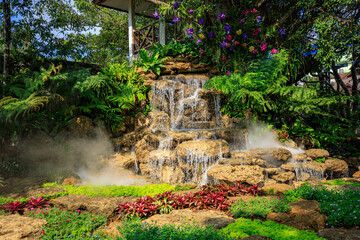 A beautifully and realistically created waterfall. © noppakit rattanathon