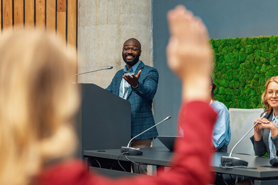 Professional presentation at a conference with audience interaction